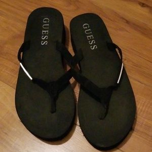 Worn once black Gusss flip flops size 7